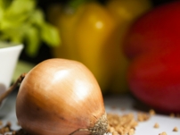 brown onion on white paper